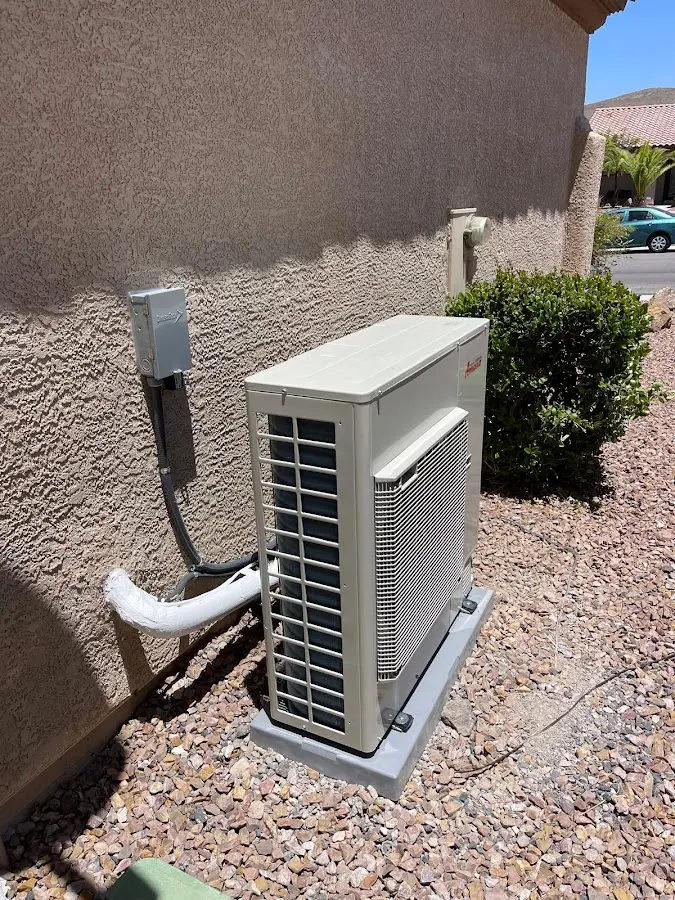 Residential air conditioning condenser unit in Bruce